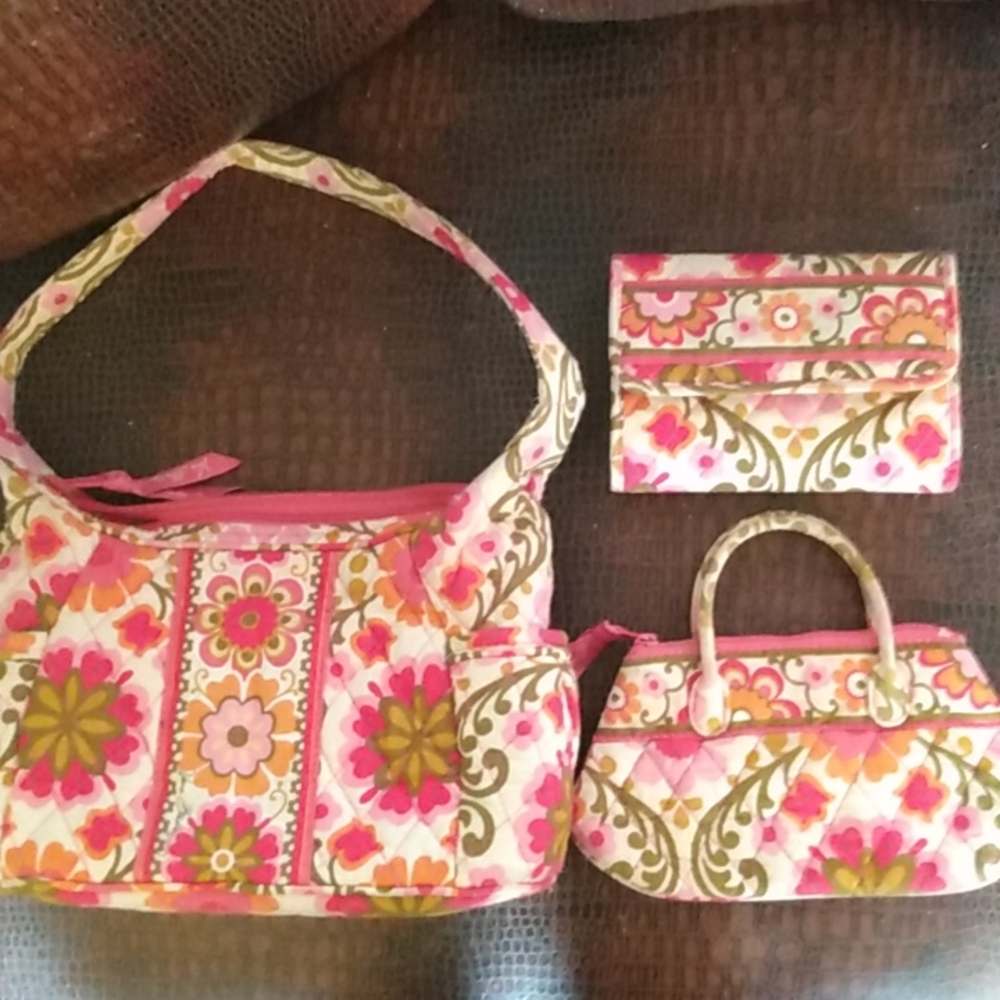 Vera Bradley set of 3 purses and wallet.